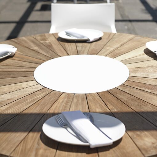 Gorgeous teak round dining table is sleek, modern and bold. three things that truly make an amazing table.