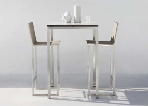 Manutti Trento Stainless Steel Bar Table Luxury with beautiful lines and modern aesthetic.