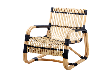 Unusual lounge chair, and a sure eye catcher, shaped from sustainable natural rattan with black bindings – lightweight yet strong and with a unique sculptural look.