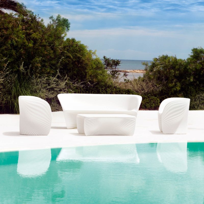 Modern Illuminating LED Lighting 2 Seater Sofa — Modern white outdoor furniture set by a pool, overlooking a beach & the sea