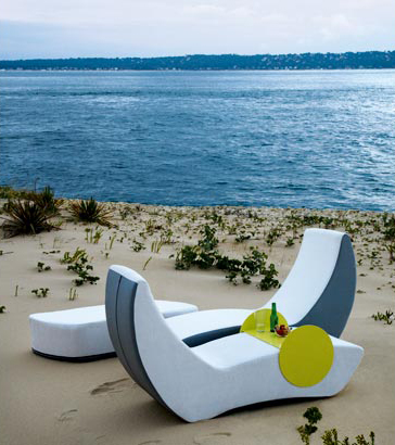 Luxurious, stacking chaise lounger is a virtual outdoor furniture lounge area.  When not used, they are fun and easy to store, intertwined like a puzzle.