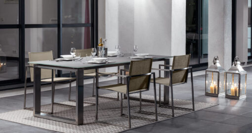 Sleek Sleek extendable stainless steel table. With modern flare and style, perfect for romantic dinners or dinner parties. stainless steel table. With modern flare and style, perfect for romantic dinners or dinner parties.