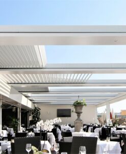 flow automatic roof open close electric remote control pergola system hotel restaurant hospitality contract residential luxury architecture dining detail